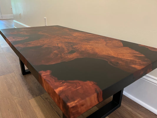 Main product view of redwood, a black epoxy and redwood table