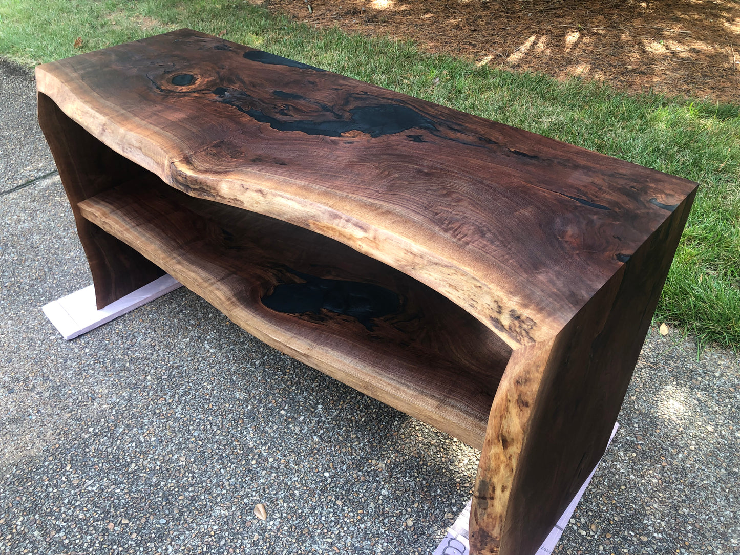 Black Walnut and Metallic Black Epoxy Entertainment Table