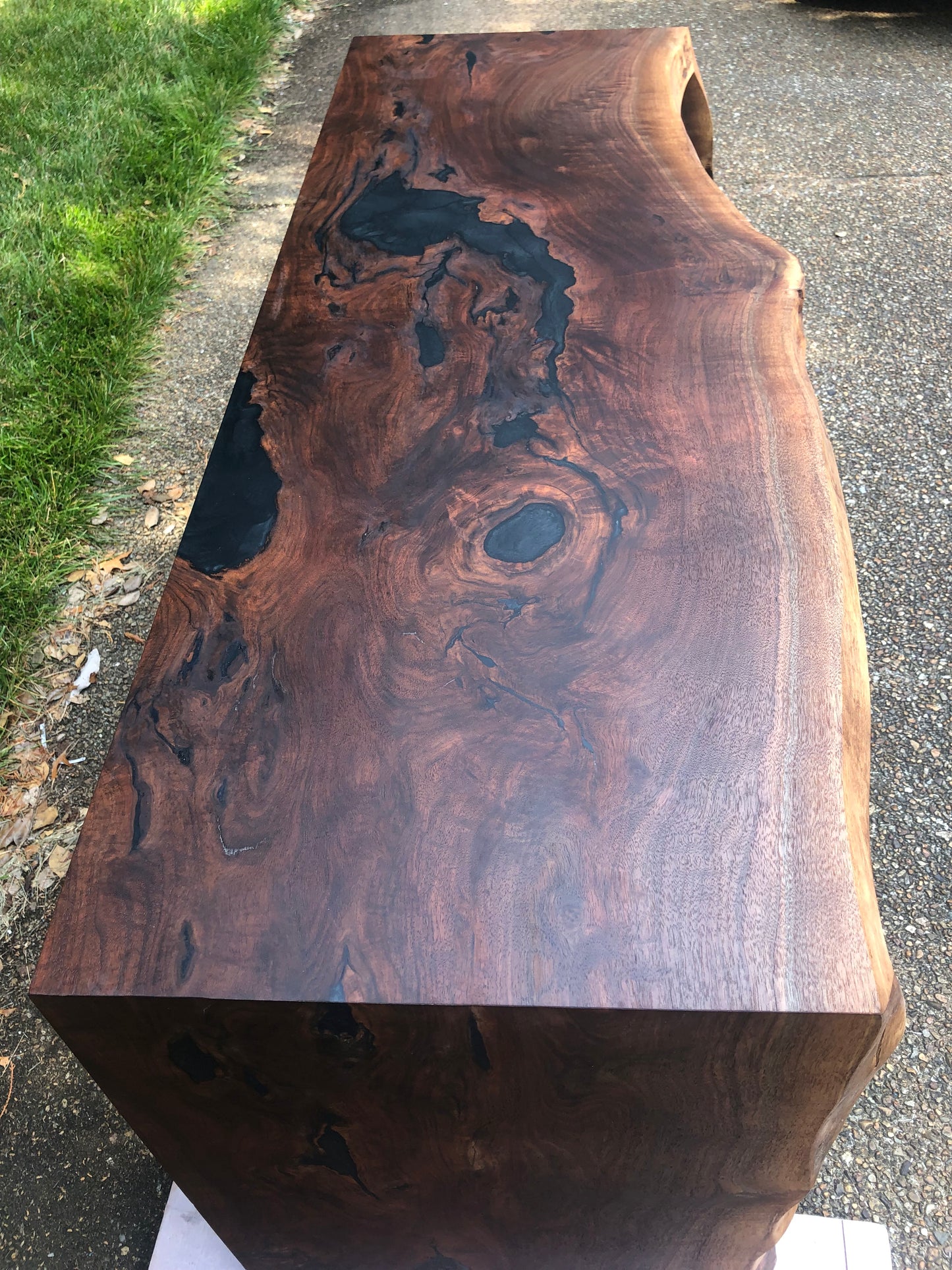 Black Walnut and Metallic Black Epoxy Entertainment Table