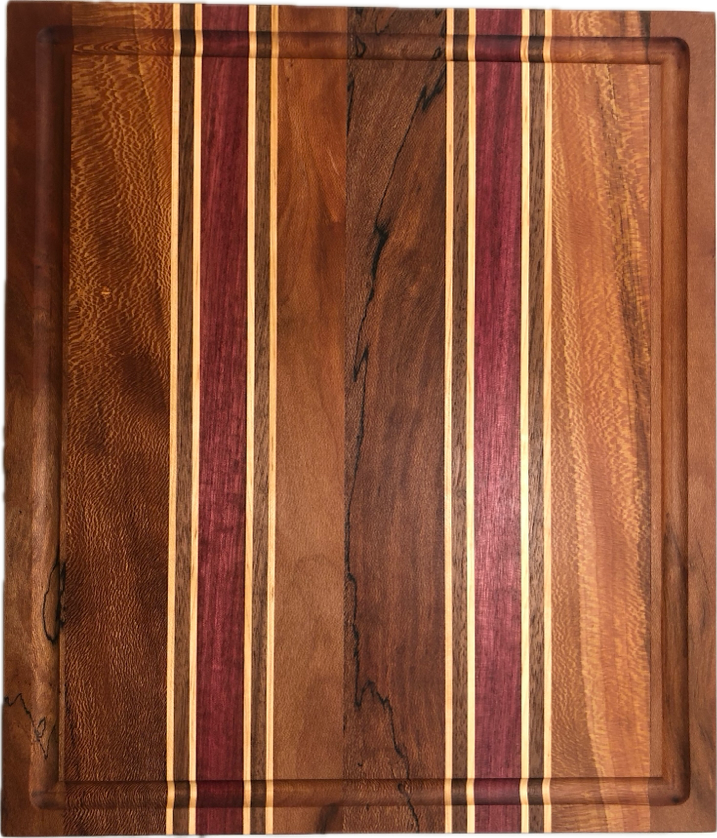 Extra Thick Long Grain Serving Board, Two of Three, Top view of cutting board highlighting two red wood grain stripes